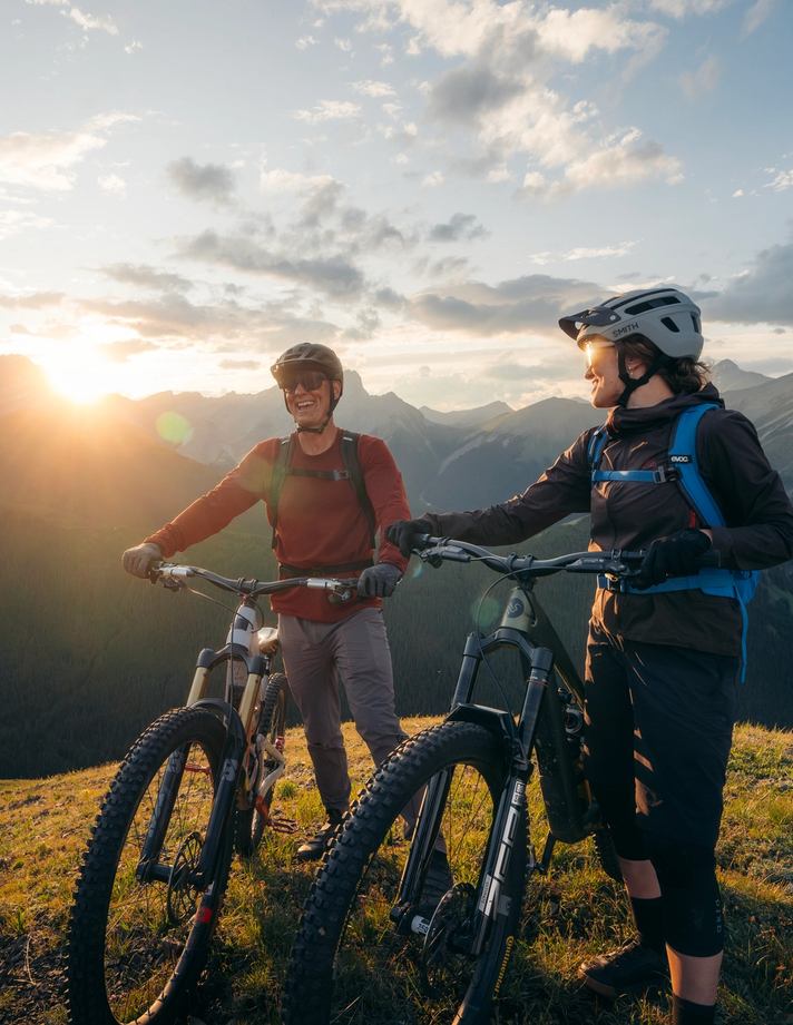 2 Mountain Bikers rest their bikes atop Fortress Mountain