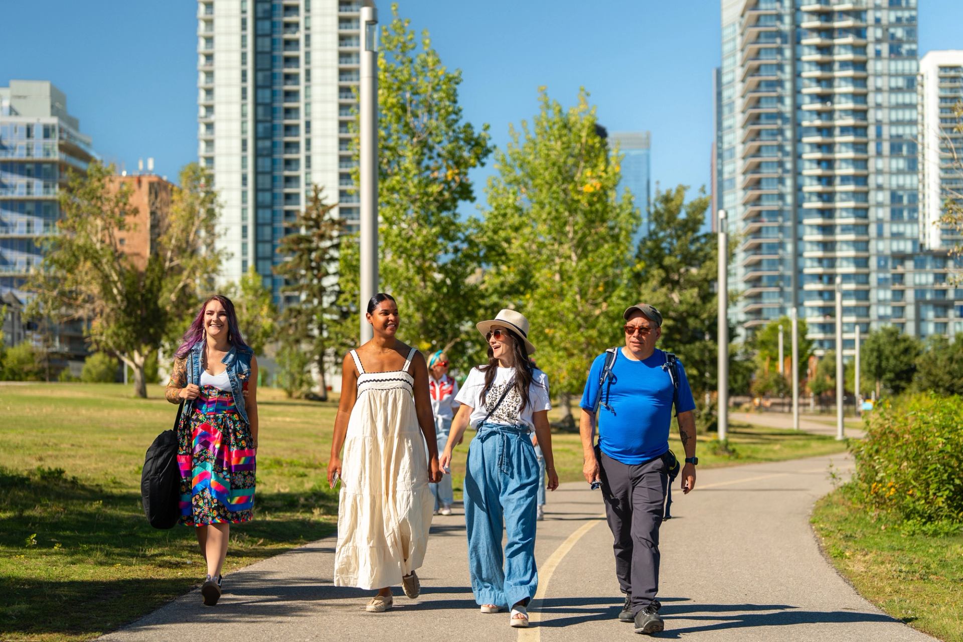 Zuc'min Guiding walks along the pathway by the Bow River in Calgary