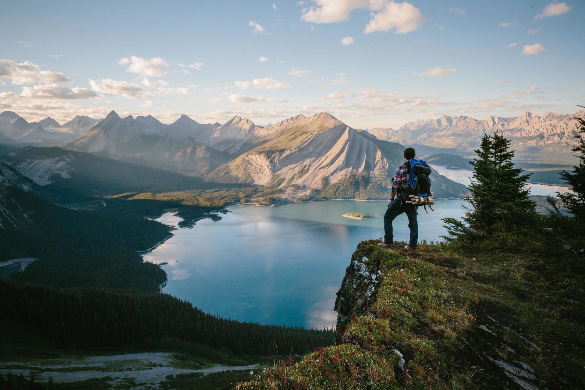 Hiker overlooking Upper Kananaskis Lake