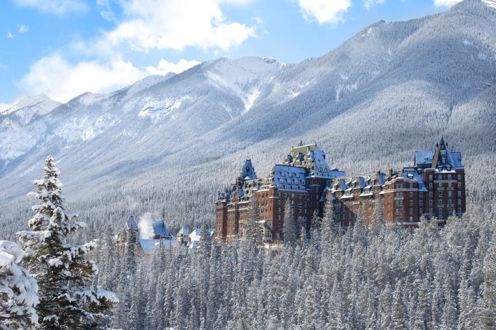Fairmont Banff Springs hotel vista against a mountain landscape