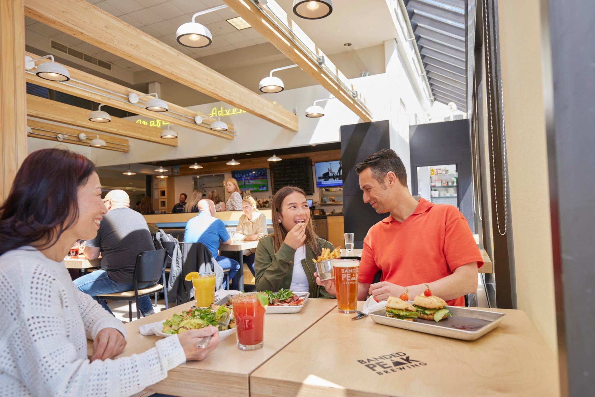 A family eats at the Calgary International Airport.