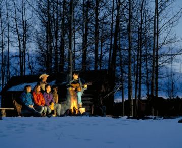 A group around the Campfire in Homeplace Ranch.