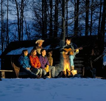 A group around the Campfire in Homeplace Ranch.