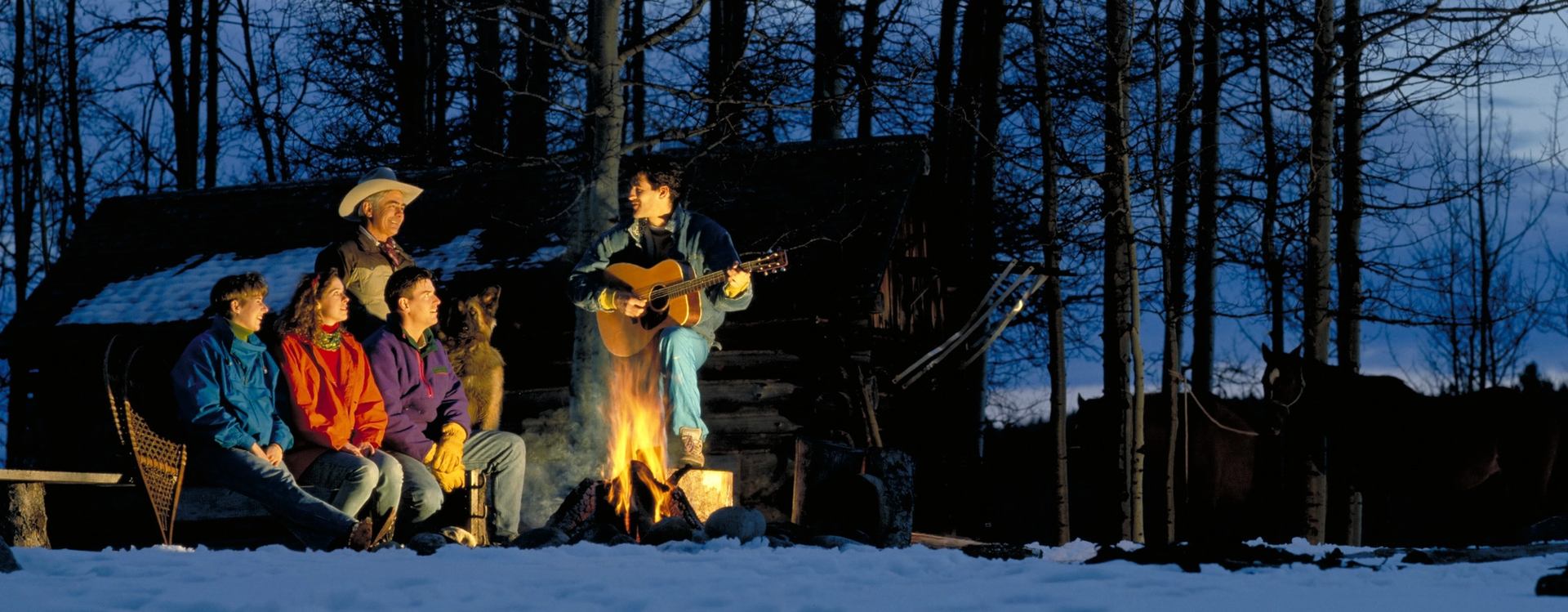 A group around the Campfire in Homeplace Ranch.