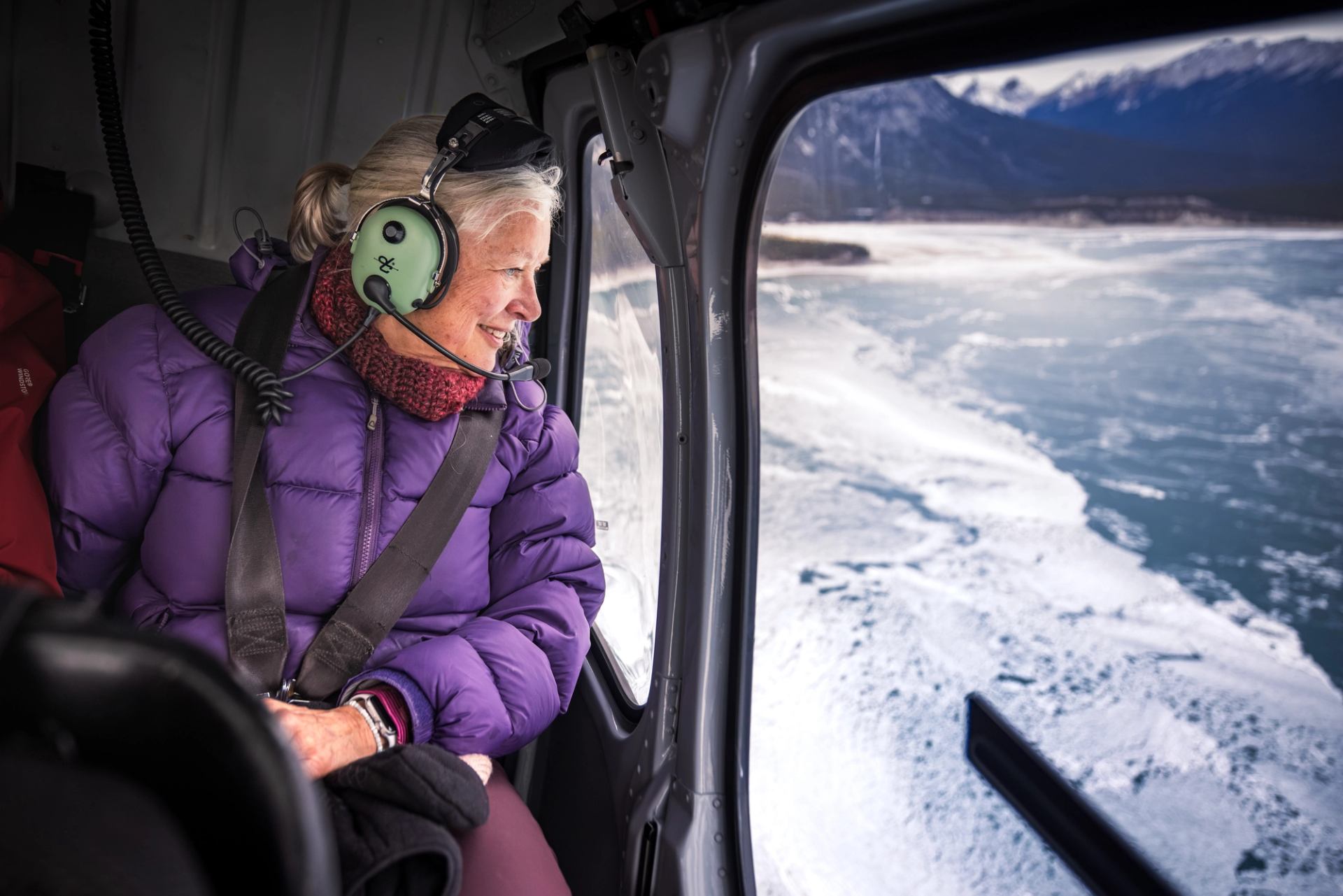 Woman enjoying helicopter tour