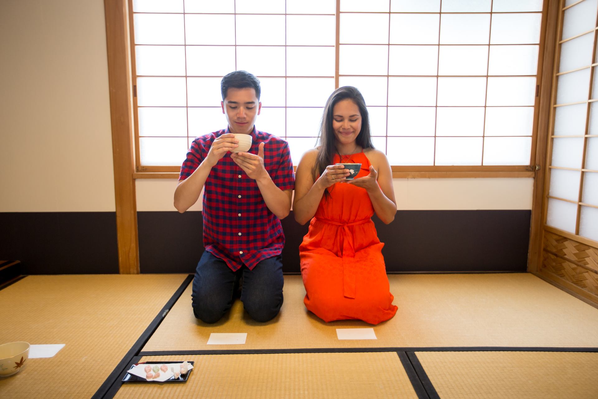 Couple experiencing a tea ceremony at the Nikka Yuko Japanese Garden.