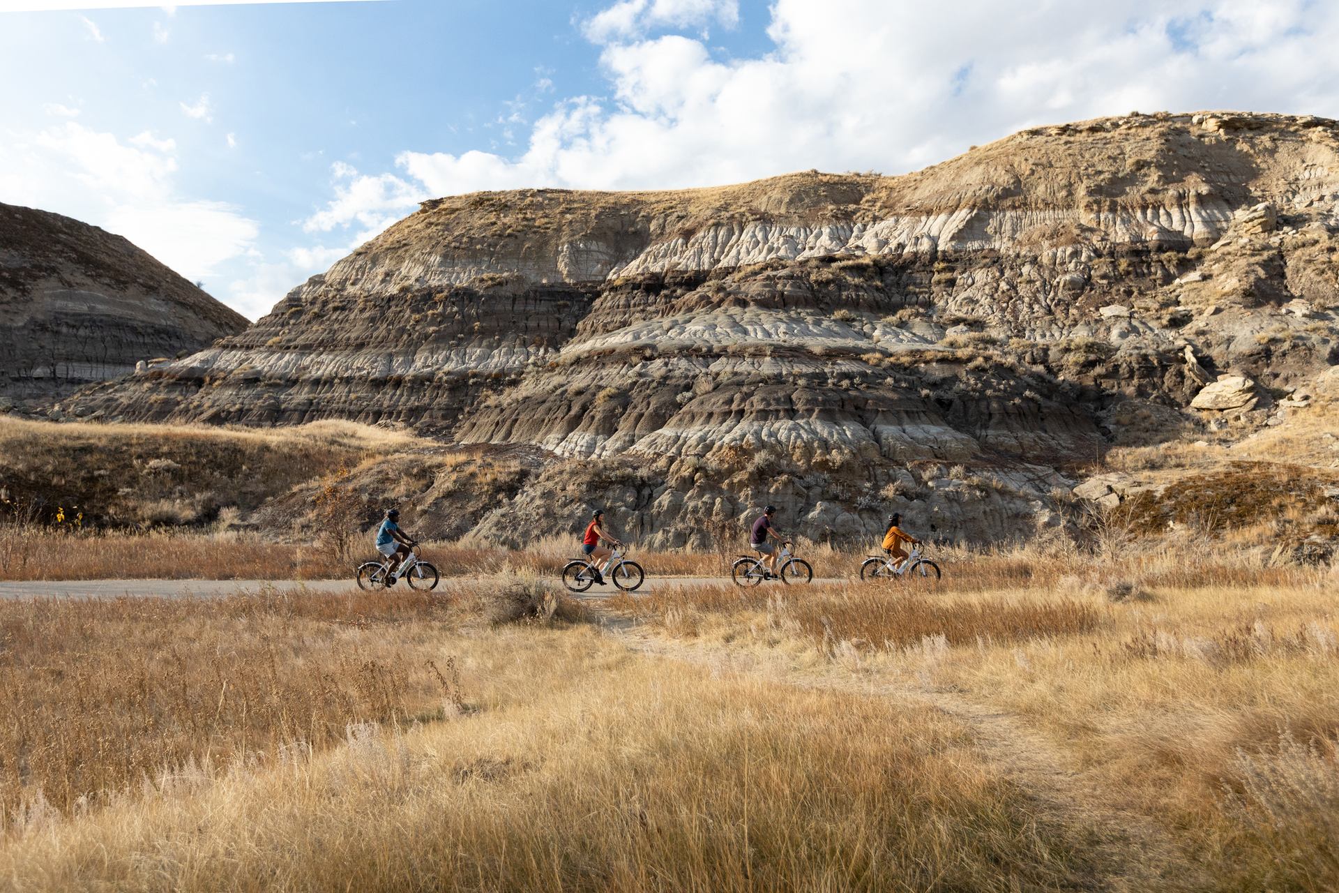 People biking on a path in Drumheller