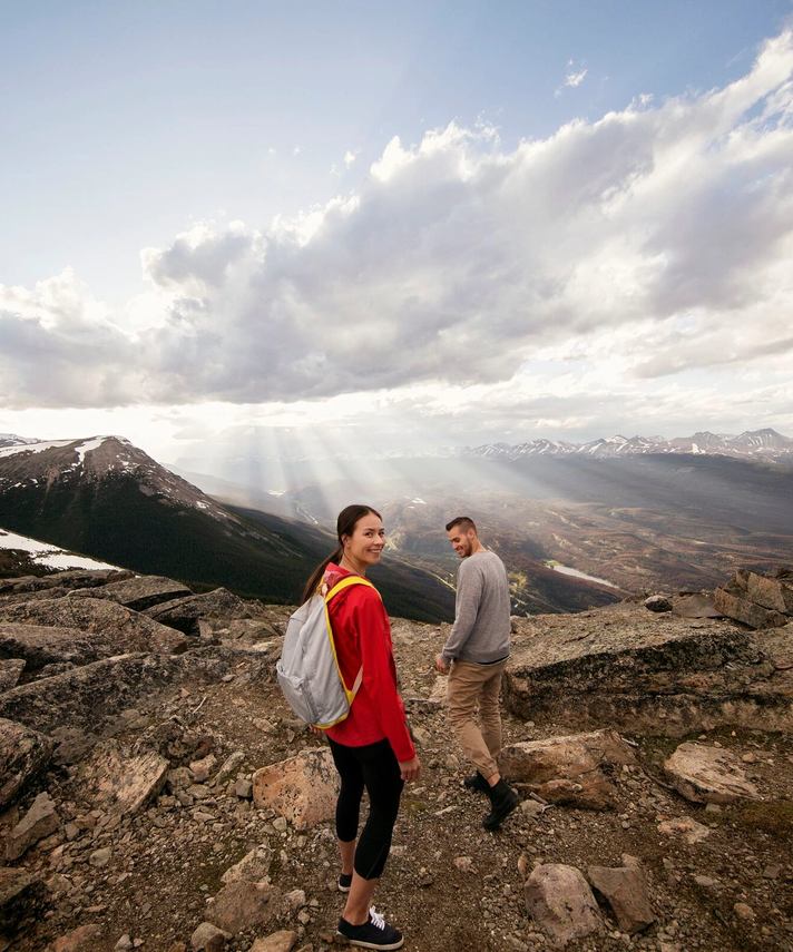 Couple hiking the trails on top Whistlers Mountain.