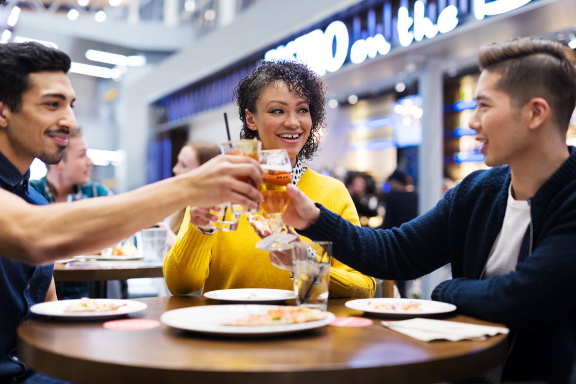 People eating out at the airport