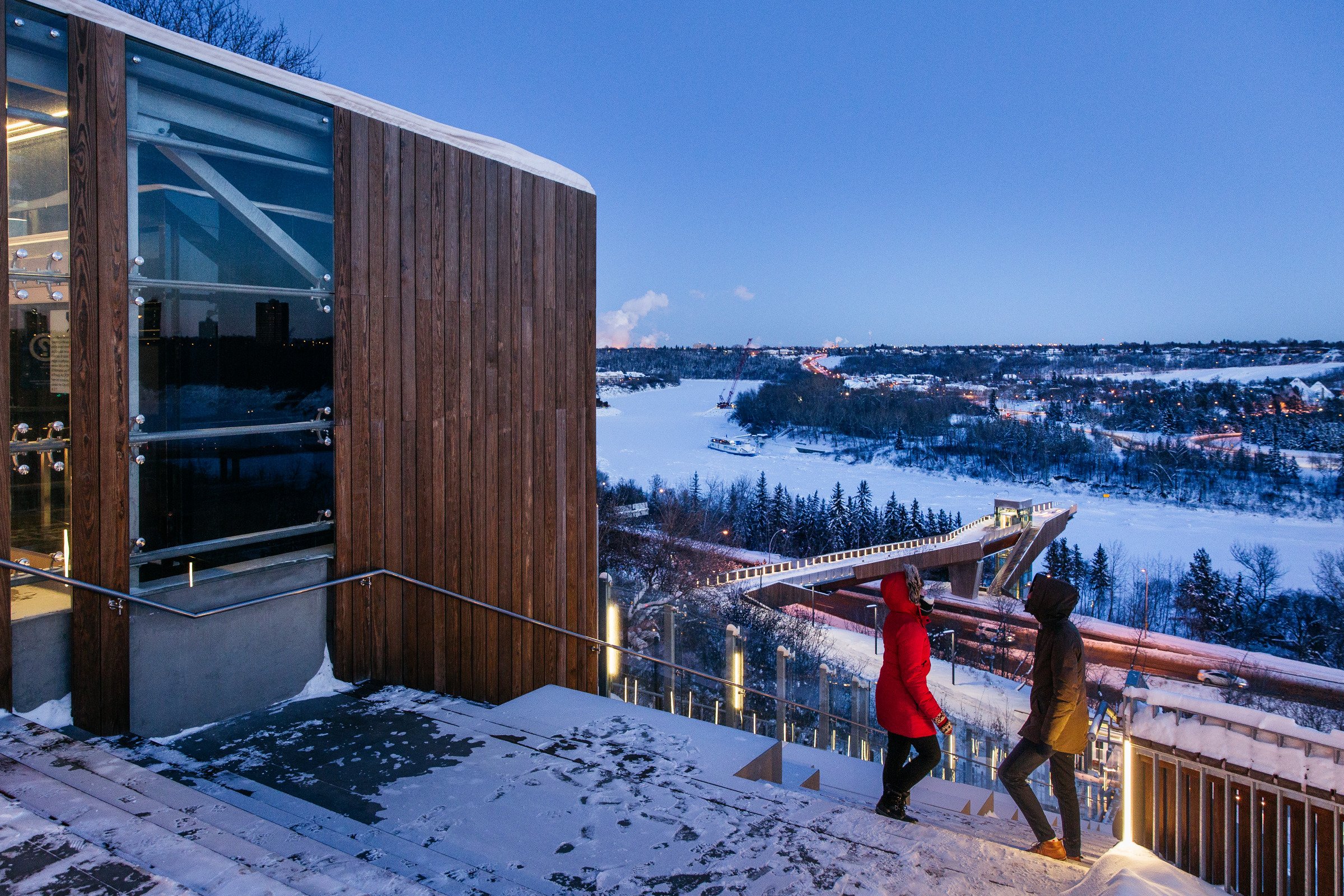 Scenic urban shot with two people and the Edmonton River Valley.