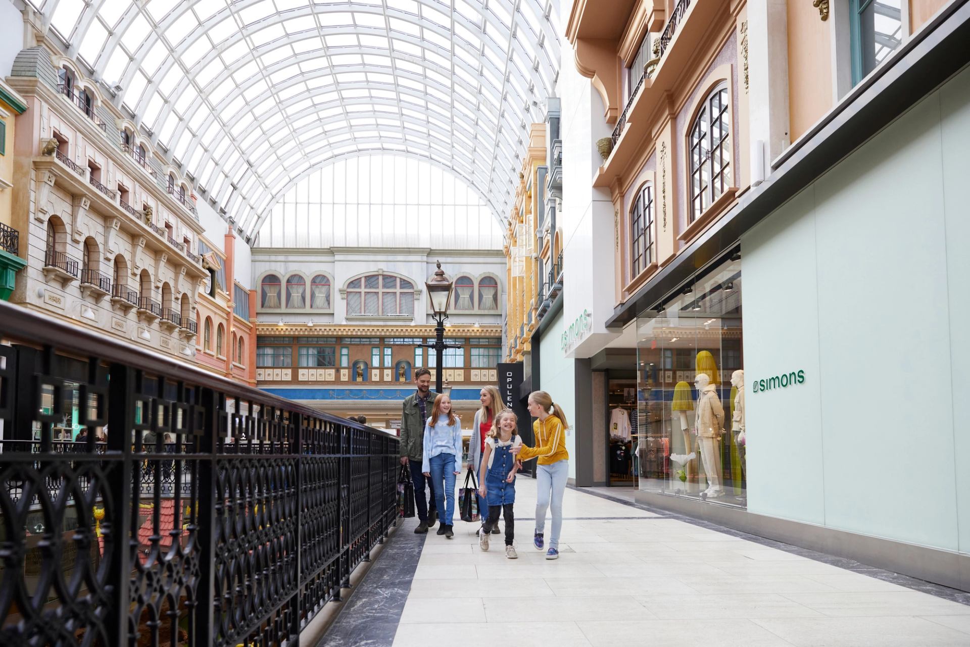 Family shopping along Europa Boulevard at West Edmonton Mall.