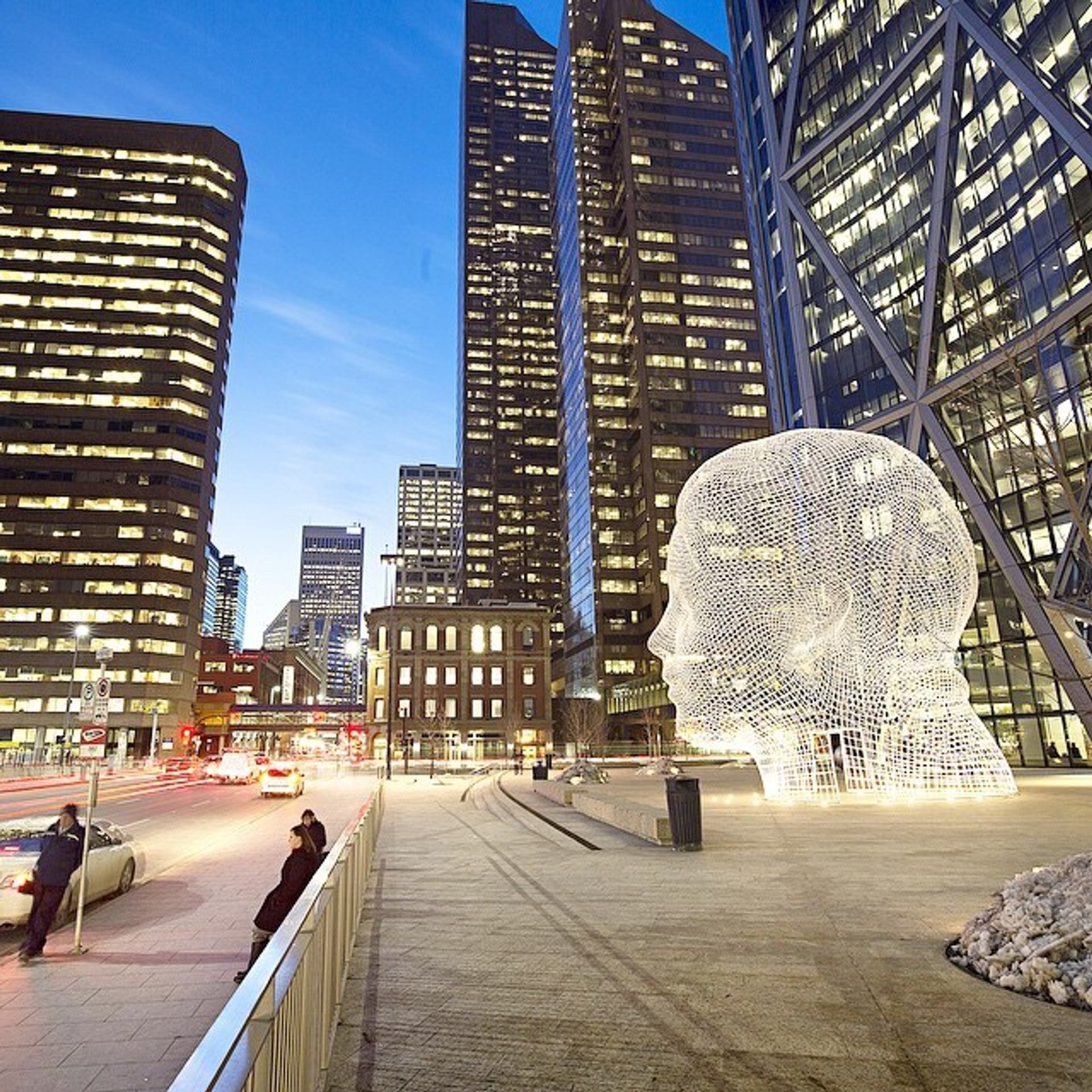 Giant head known as the Wonderland Sculpture in downtown Calgary.