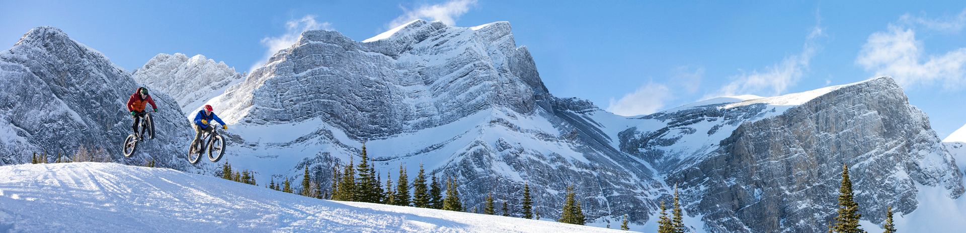 Two people fat biking in Kananaskis Country.