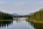 Aerial of two people standup paddle boarding (SUP) on Kelley's Bathtub in William A. Switzer Provincial Park