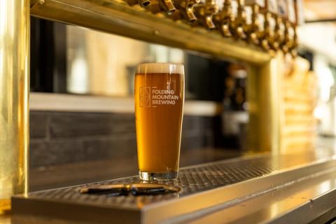 Close-up of a pint of beer at Folding Mountain Brewing Taproom and Kitchen jasper