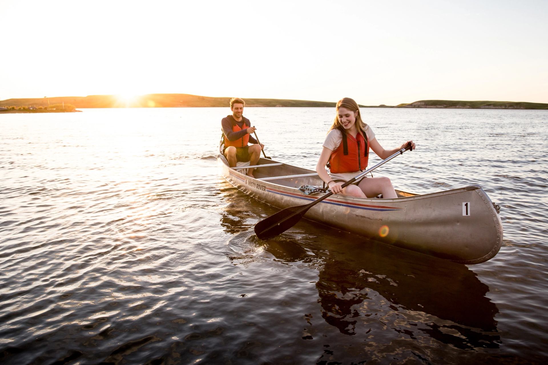 Couple canoeing on Elkwater Lake