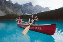 2 people canoeing on Moraine Lake.