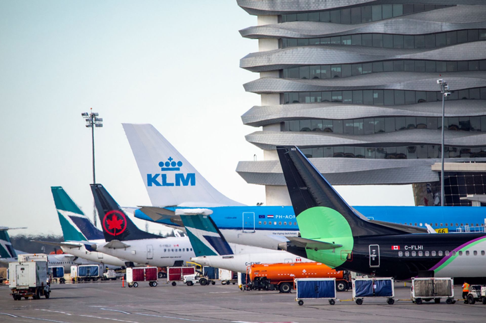 Planes on a tarmac at an airport