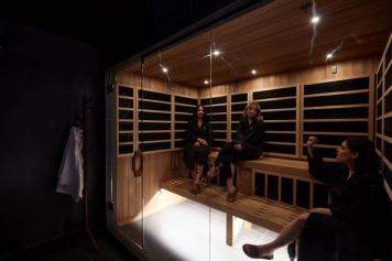 A group relax in a sauna at SKA.