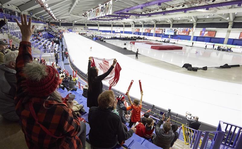 Fans cheering on athletes at the Olympic Oval in Calgary.