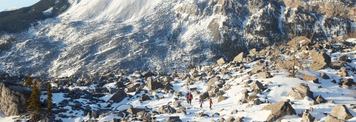 People hiking and exploring at Frank Slide in the Crowsnest Pass.