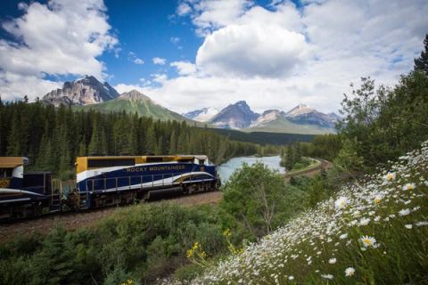 Rocky Mountaineer cars about to round Morant's Curve