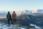Hikers stop to take in the view while winter hiking in William A. Switzer Provincial Park