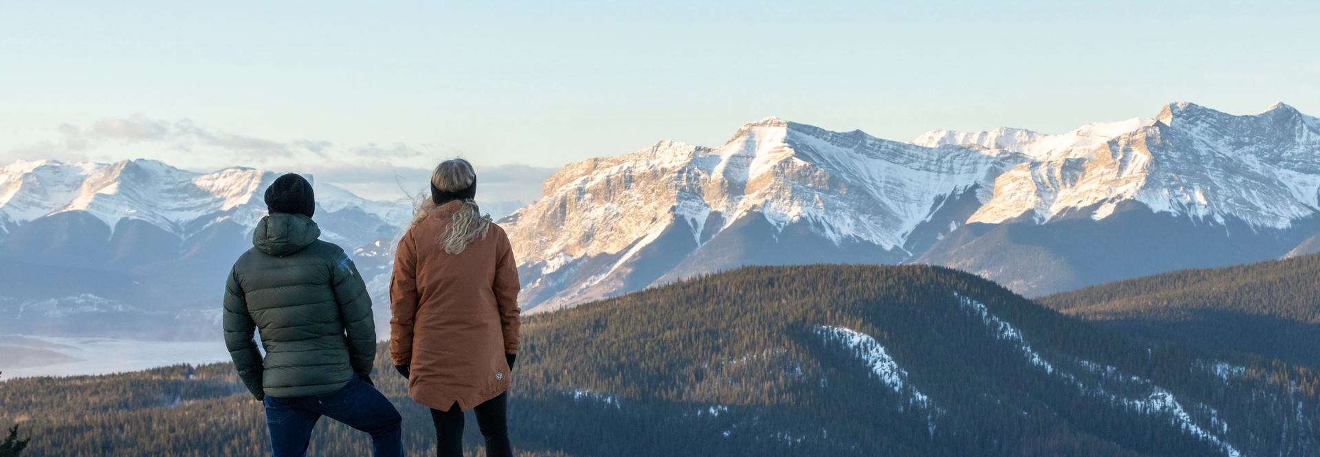 Hikers stop to take in the view while winter hiking in William A. Switzer Provincial Park