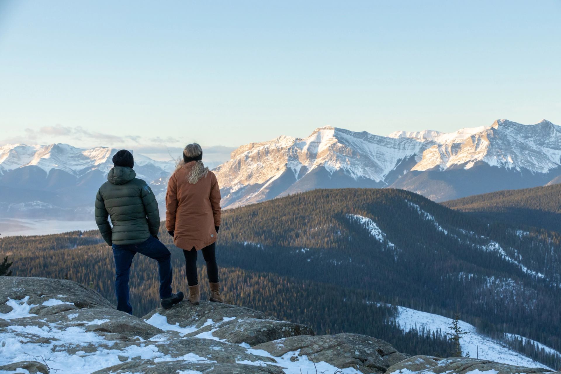 Hikers stop to take in the view while winter hiking in William A. Switzer Provincial Park