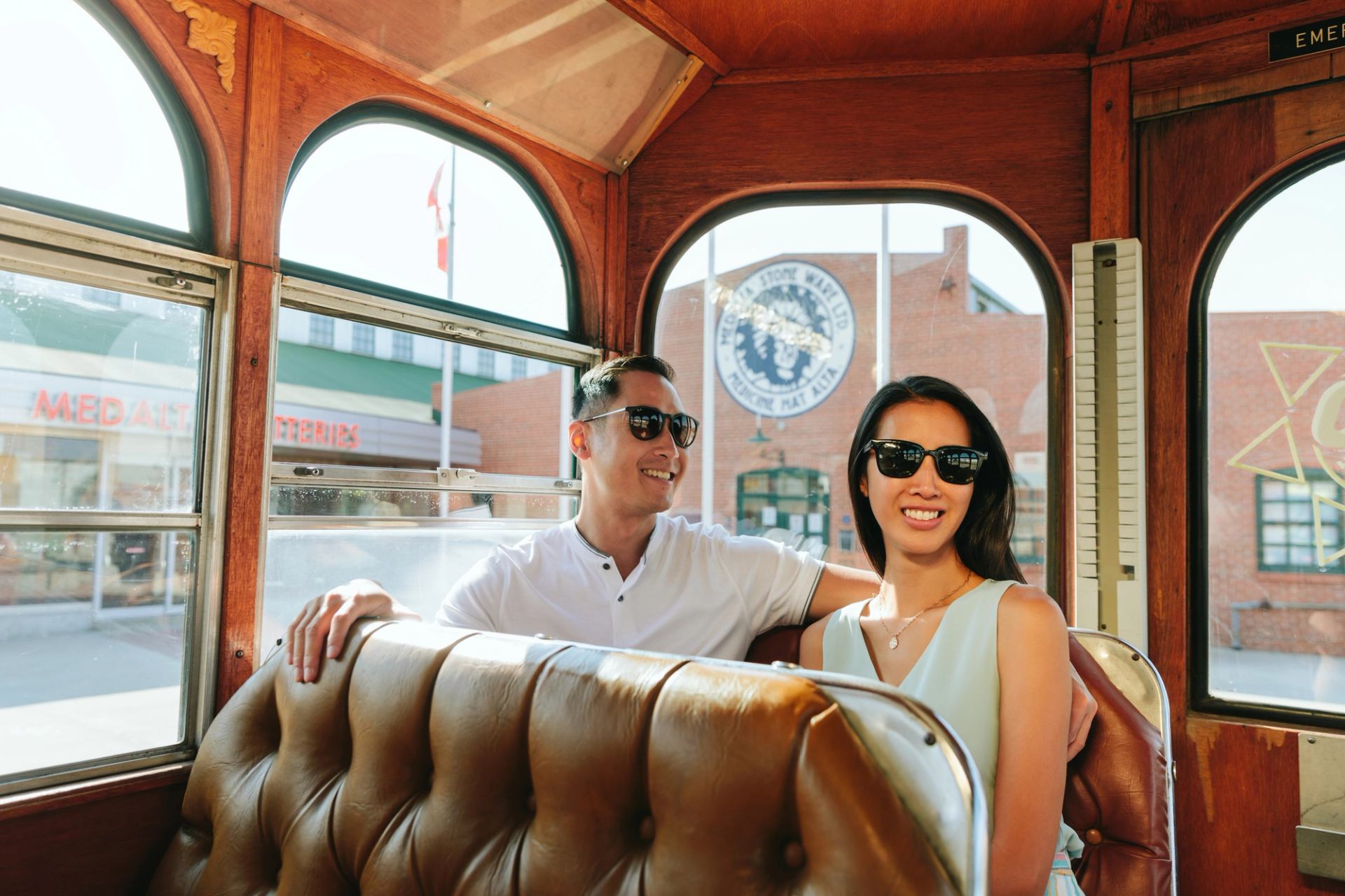 A couple rides the Sunshine Trolley in Medicine Hat, taking in the city’s attractions.