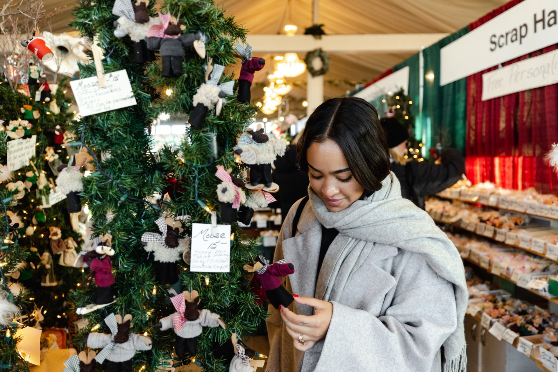 A shopper browsing at the Spruce Meadows International Christmas Marker
