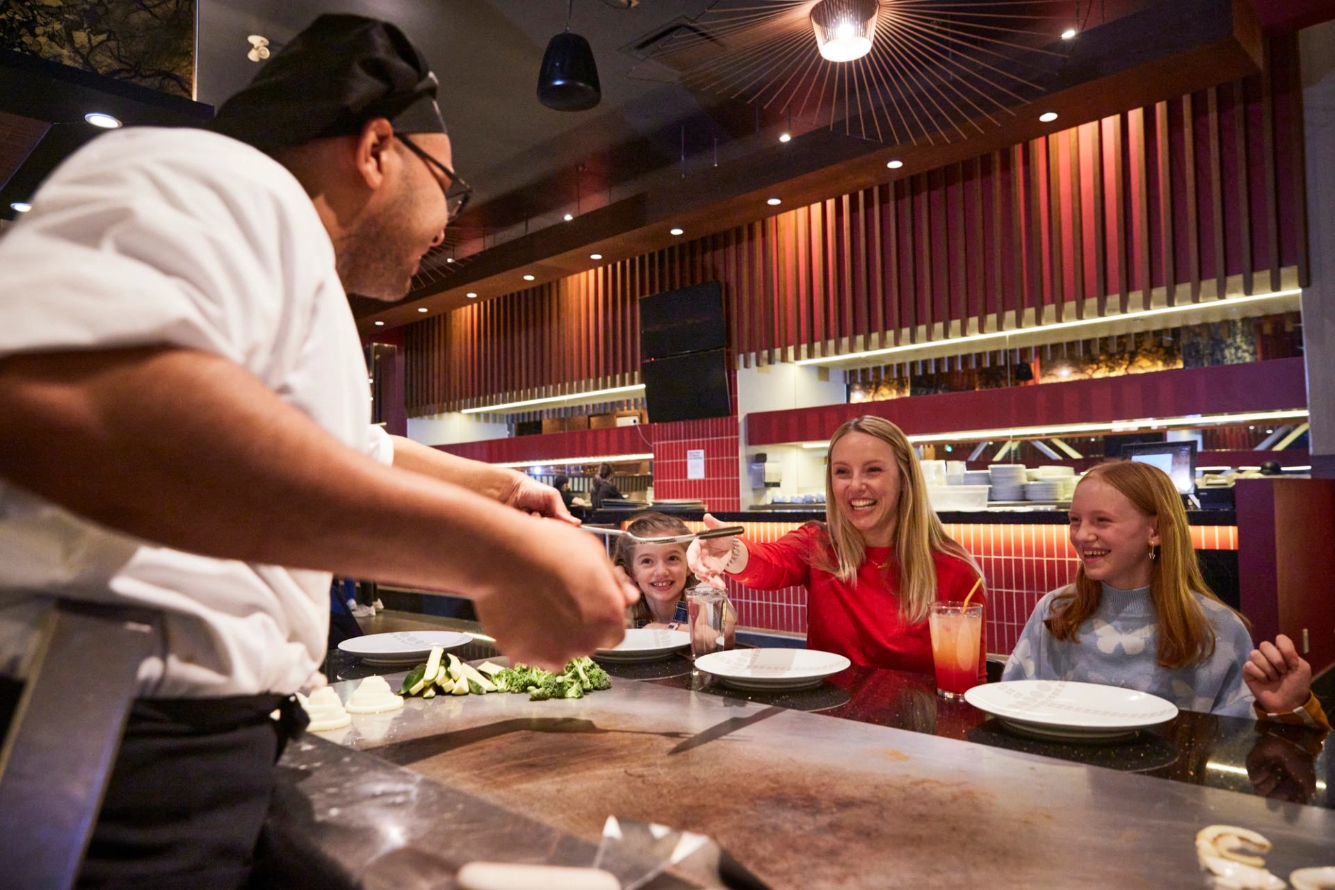 Family being served at Japanese Village on BRBN St. in West Edmonton Mall