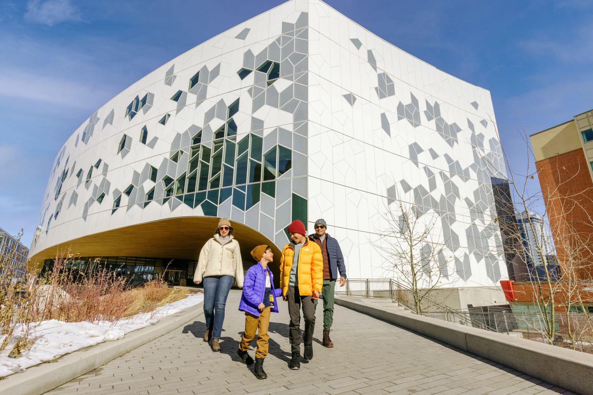 Family leaving the Central Library in downtown Calgary