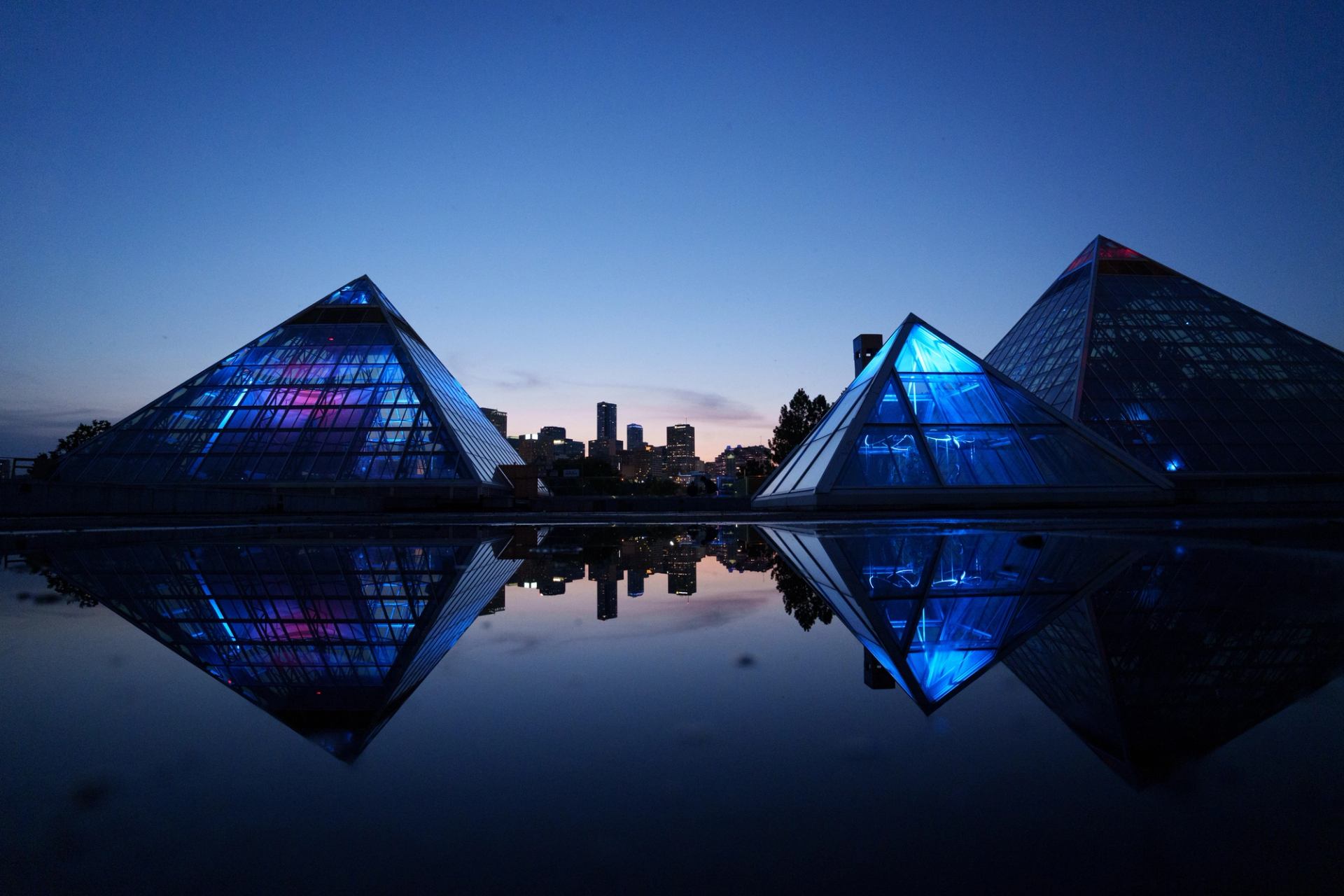 A night time photo of the Muttart Conservatory in Edmonton.