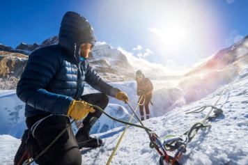 Descending into crevasse at Columbia Icefields with Rockaboo Adventures in their Tread Lightly Glacier Hike tour.
