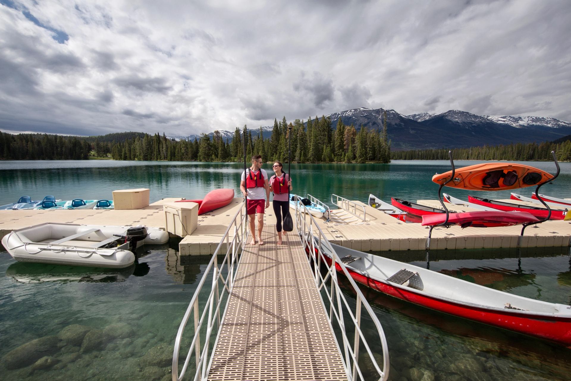 Couple on the dock at Fairmont Jasper Park Lodge
