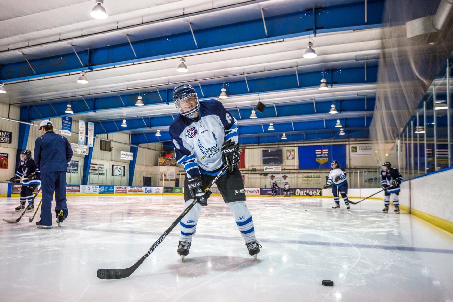 Participants attend an on-ice session at the Learn How To Be A Hockey Player program with Pinnacle Hockey in Canmore.