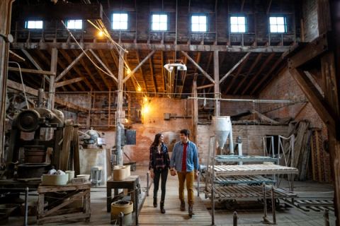 A couple visiting Medalta in the Historic Clay District in Medicine Hat.