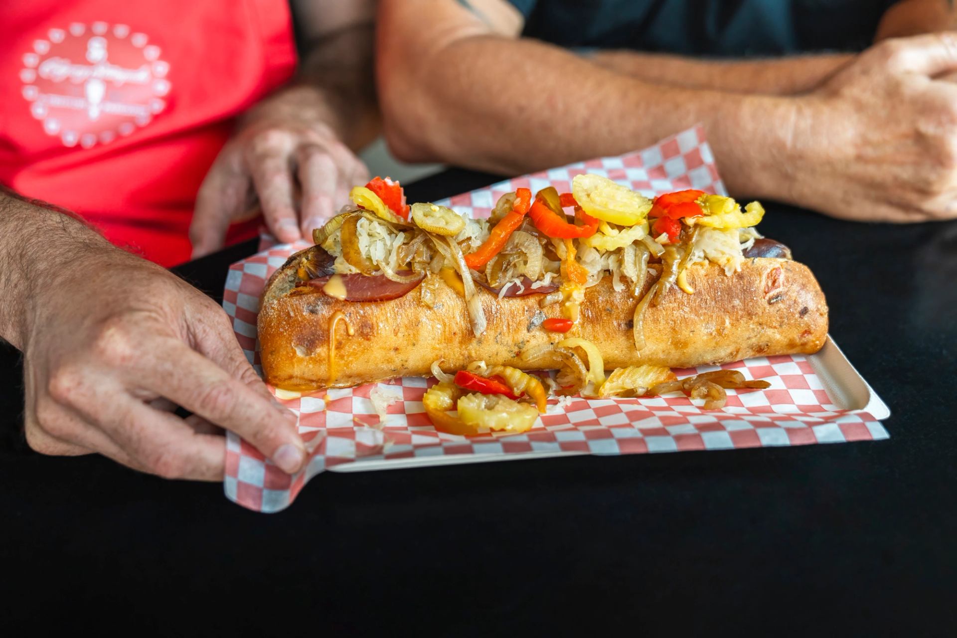 A loaded sausage on a bun at the Calgary Stampede.