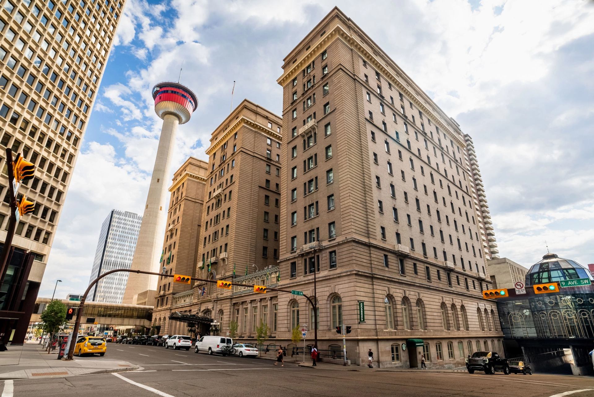 Exterior of the Fairmont Palliser Hotel beside the Calgary Tower.