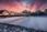 A winter sunrise lights up the sky over Peace Bridge in Calgary.