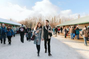 Couple Christmas shopping at Millarville Christmas market