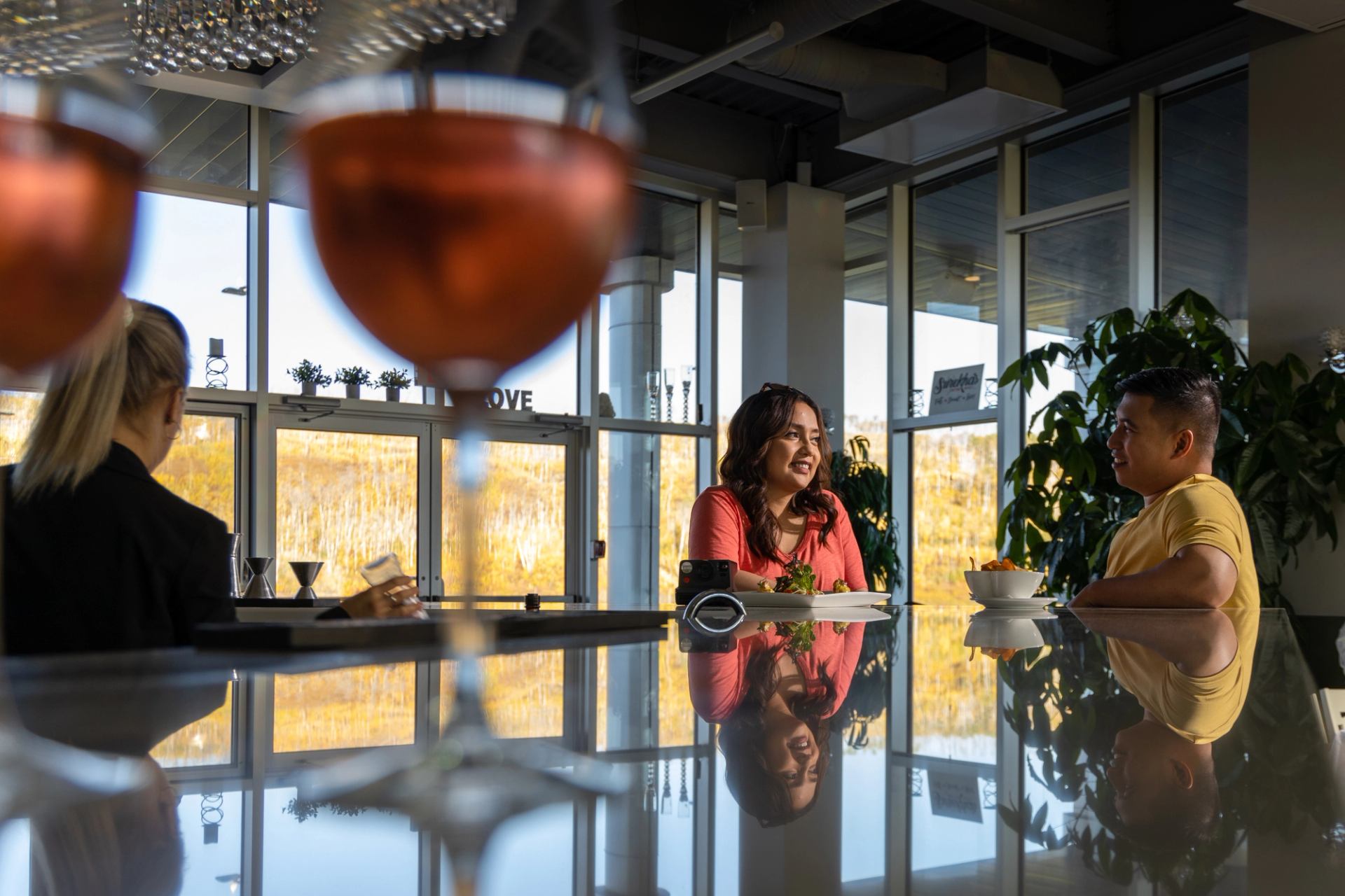 A couple dine at Surekha's on the Snye.