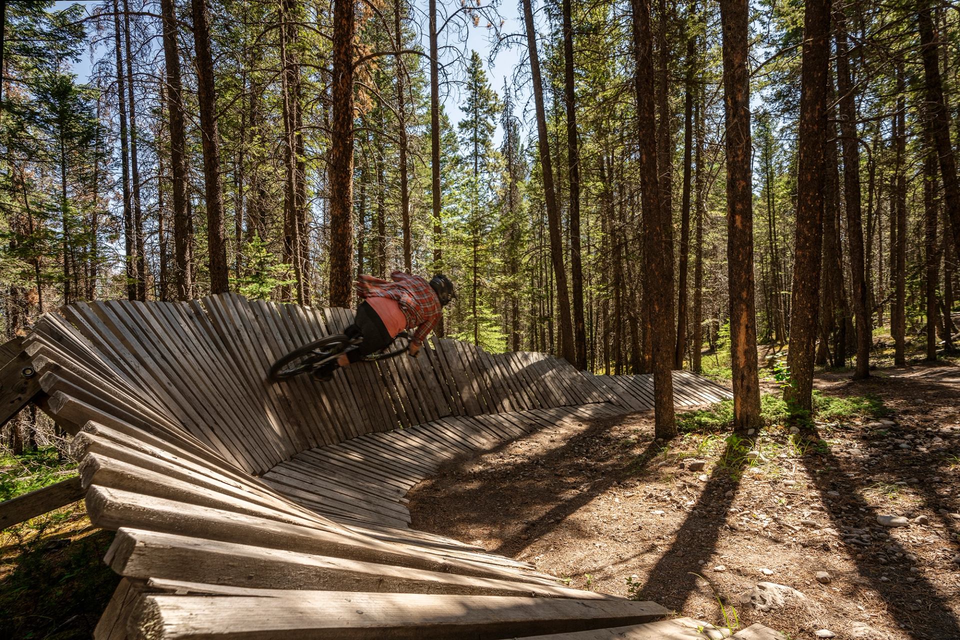 Person riding mountain bike on Star Wars Bike Trail in Banff.