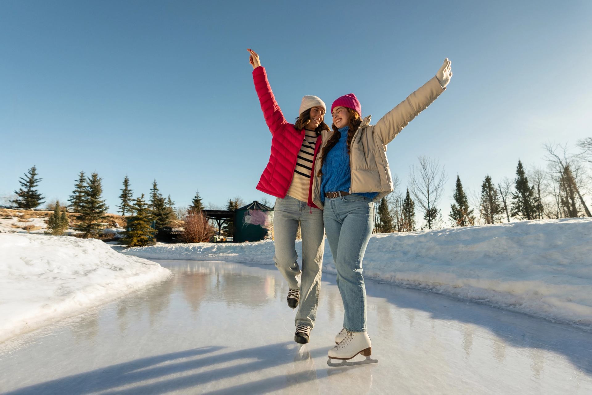 Two people go skating together.