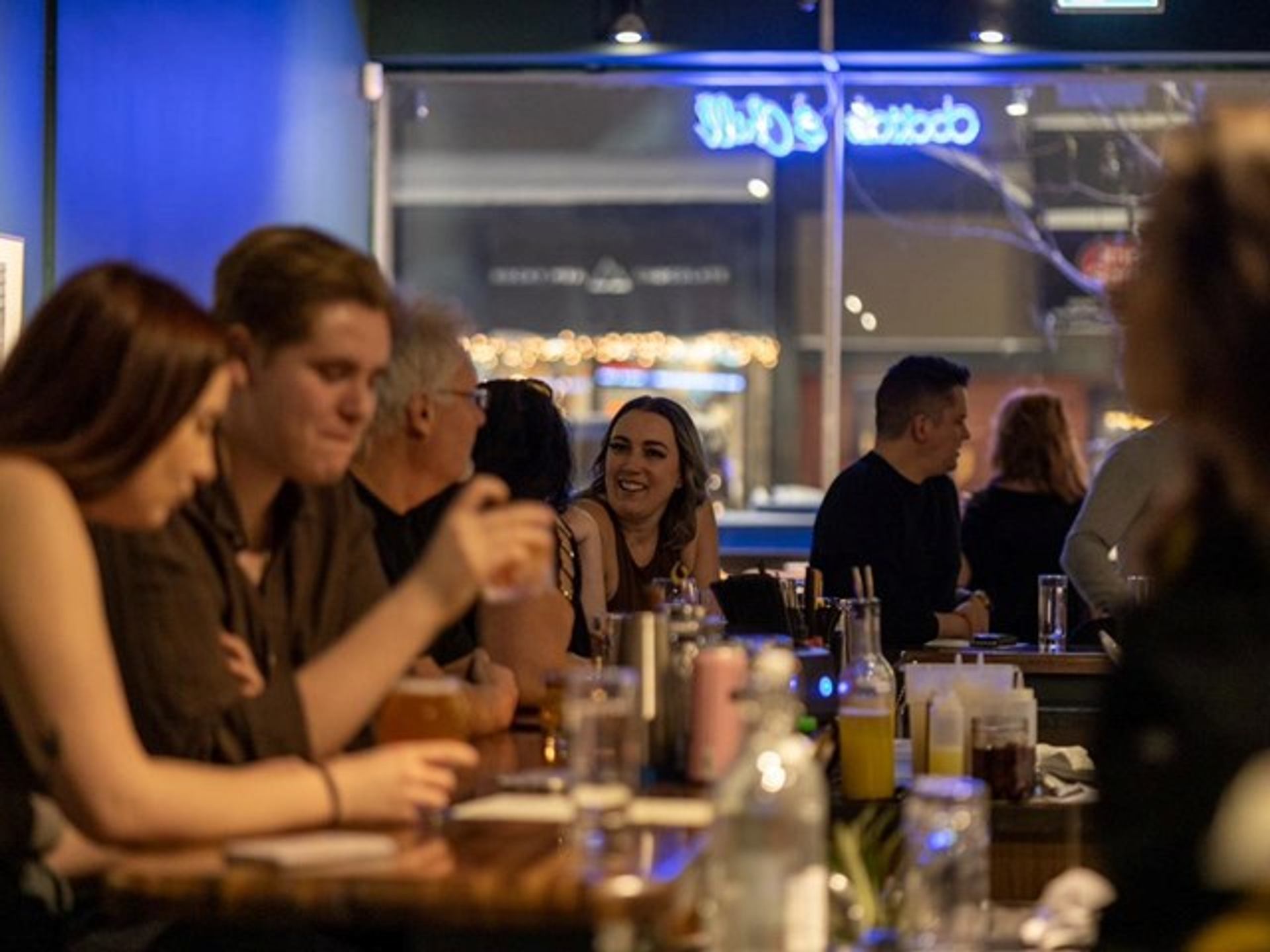 People having drinks at 92 Beverage Co.