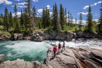 People on a guided hike in Castle Provincial Park with Heather Davis from Uplift Adventures.