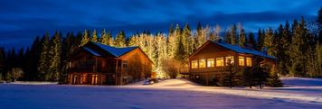 Exterior of the elevation in the evening at the Prairie Creek Inn