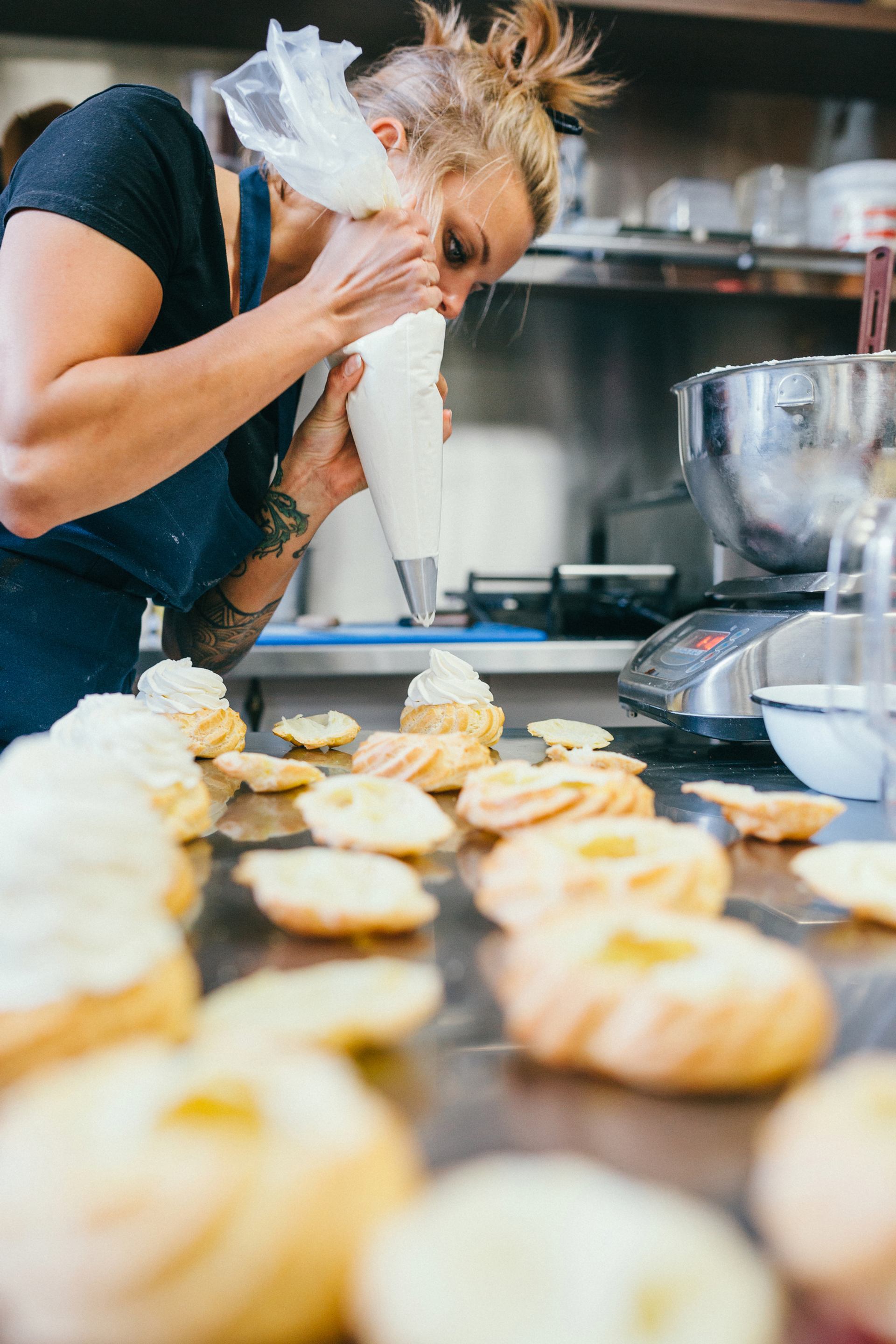 Baker making pastries