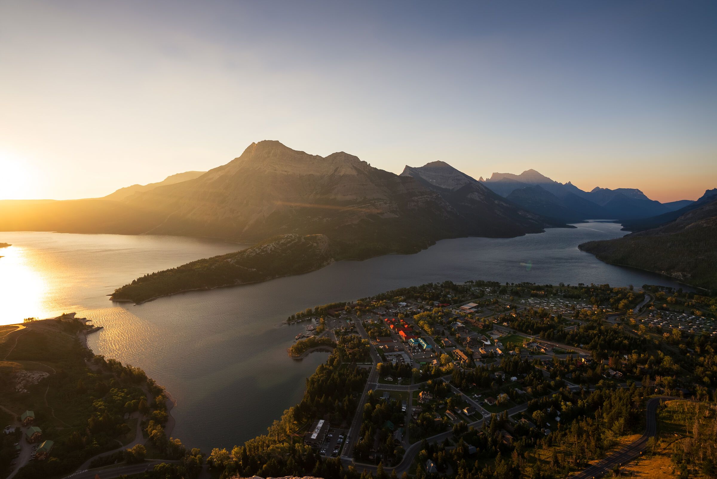 The town of Waterton view from above at sunrise from Bear's Hump.
